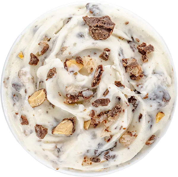 Creamy ice cream with chocolate and nut chunks in close-up view. Perfect dessert treat for chocolate lovers.