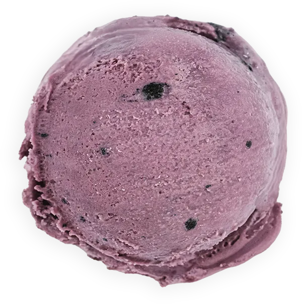 Scoop of creamy purple ice cream with berry chunks on a black background.