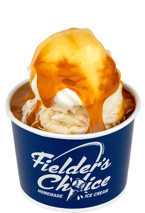 Creamy vanilla ice cream drizzled with Butterscotch sauce in a Fielder's Choice cup.