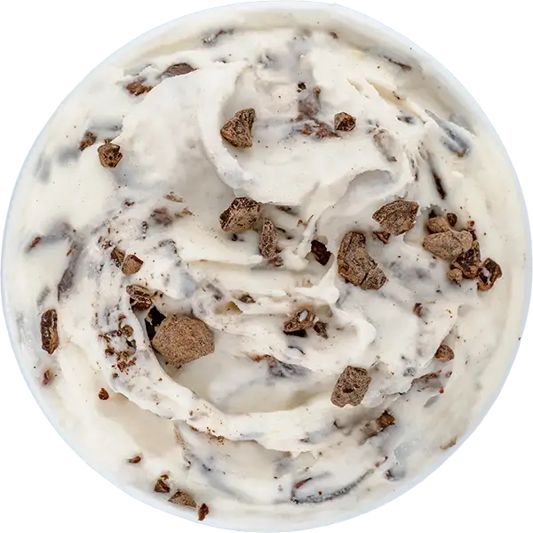 Creamy ice cream with chocolate cookie chunks on top, perfect for dessert lovers craving a sweet, crunchy treat.