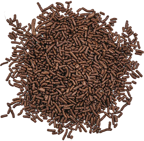 A pile of chocolate sprinkles scattered on a white background, perfect for ice cream and dessert toppings.