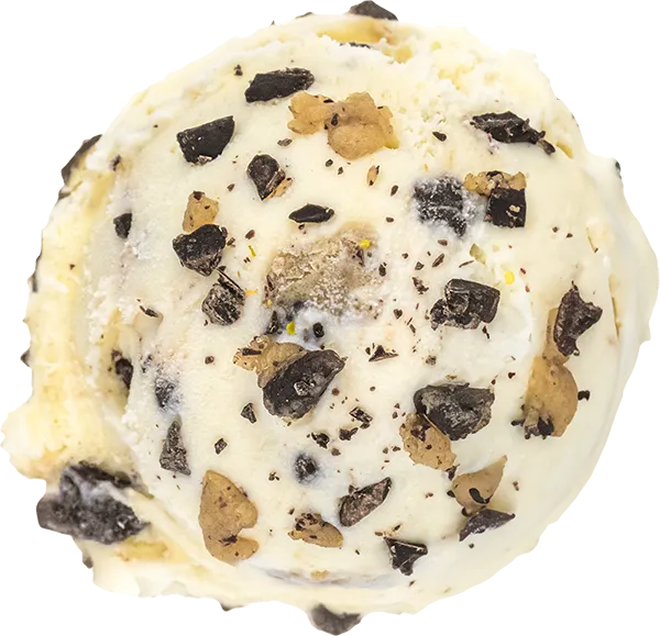 A creamy cookie dough ice cream scoop with chocolate chunks, close-up view.