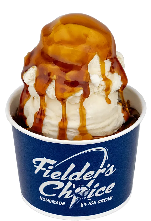 Vanilla ice cream in a cup with maple sauce from Fielder's Choice Homemade Ice Cream.