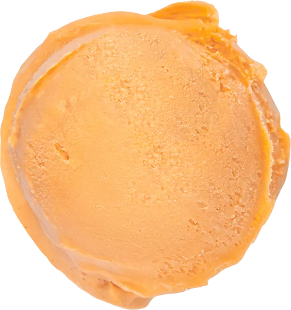 Close-up of a creamy orange ice cream scoop, perfect summer treat.