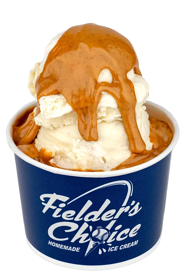 Vanilla ice cream in Fielder's Choice cup topped with rich caramel sauce.