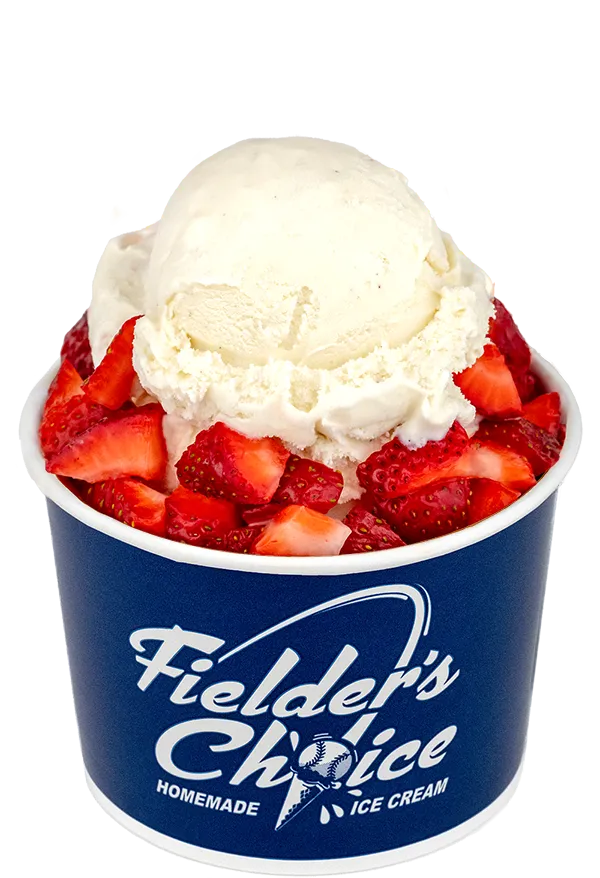 Vanilla ice cream with fresh strawberries in a branded cup from Fielder's Choice Homemade Ice Cream.