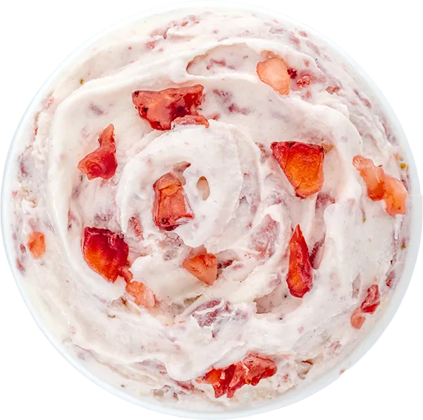 Creamy strawberry ice cream with fresh strawberry chunks, viewed from above, in a circular swirl pattern.