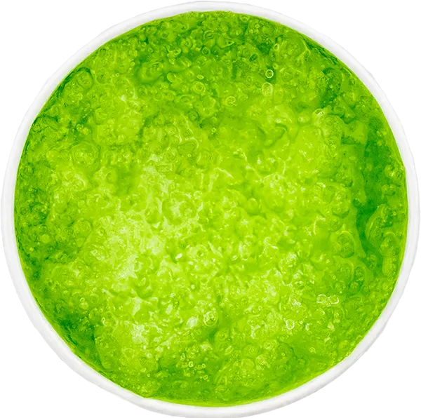 Bright green Watermelon Slushie in a round container, highlighting its fresh and vibrant texture